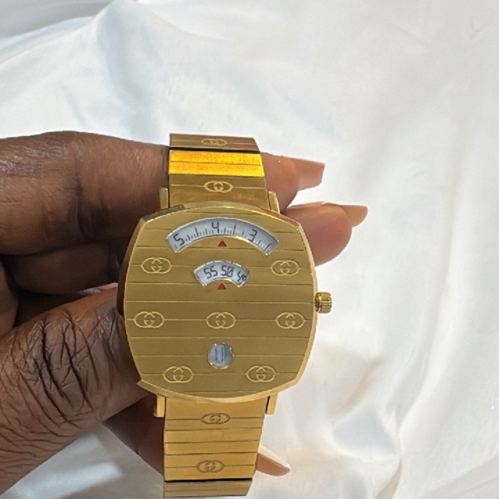 Gucci Gold Watch with Distinctive Dial